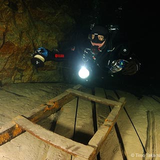 diver exploring a mine